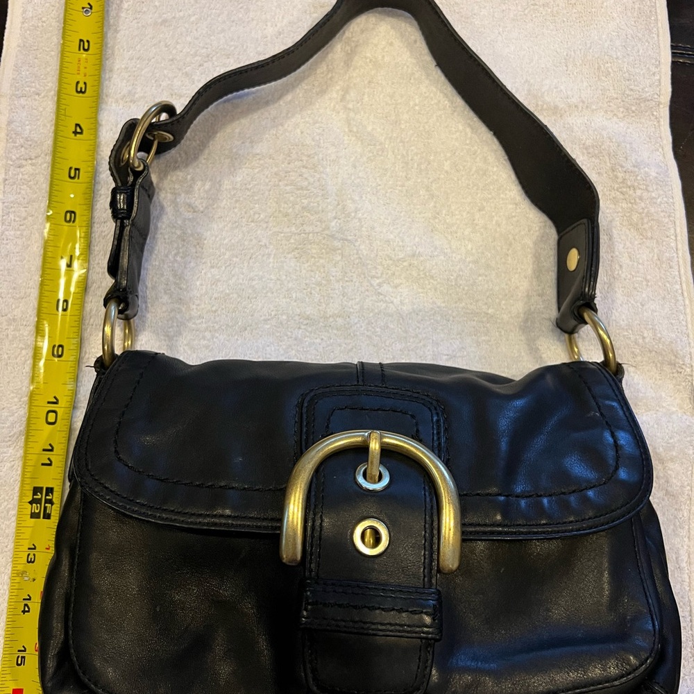 Coach.  Good condition. See photos for measurements.